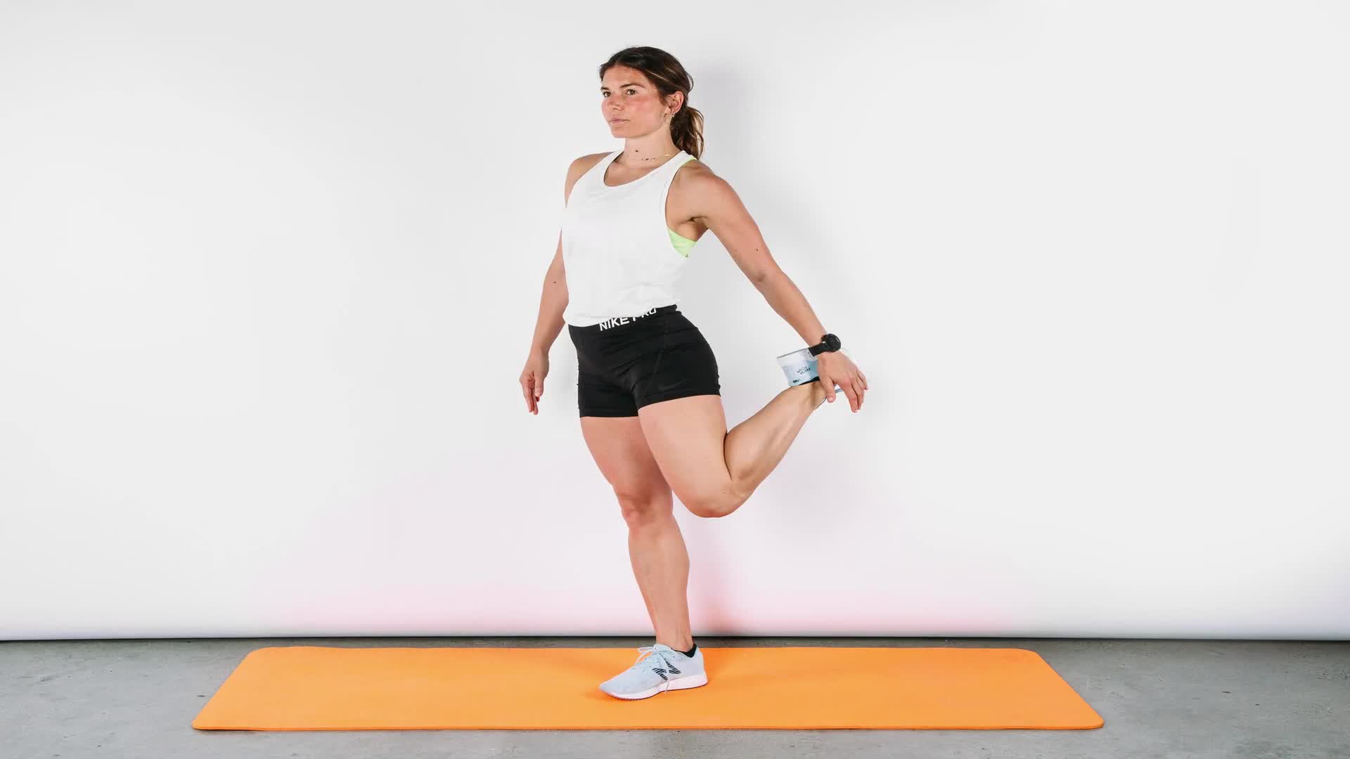 standing elevated quad stretch