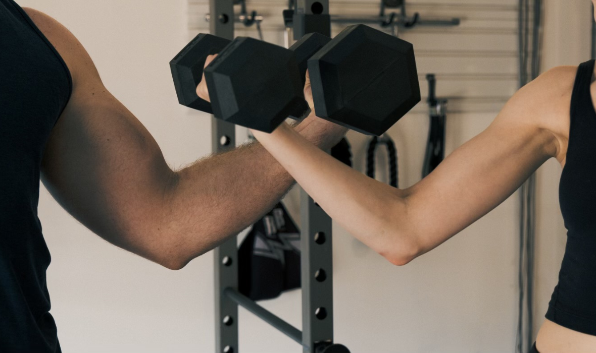 seated one-arm dumbbell palms-down wrist curl